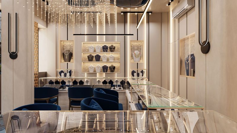 A premium jewellery showroom with lit display cases and lounge seating
